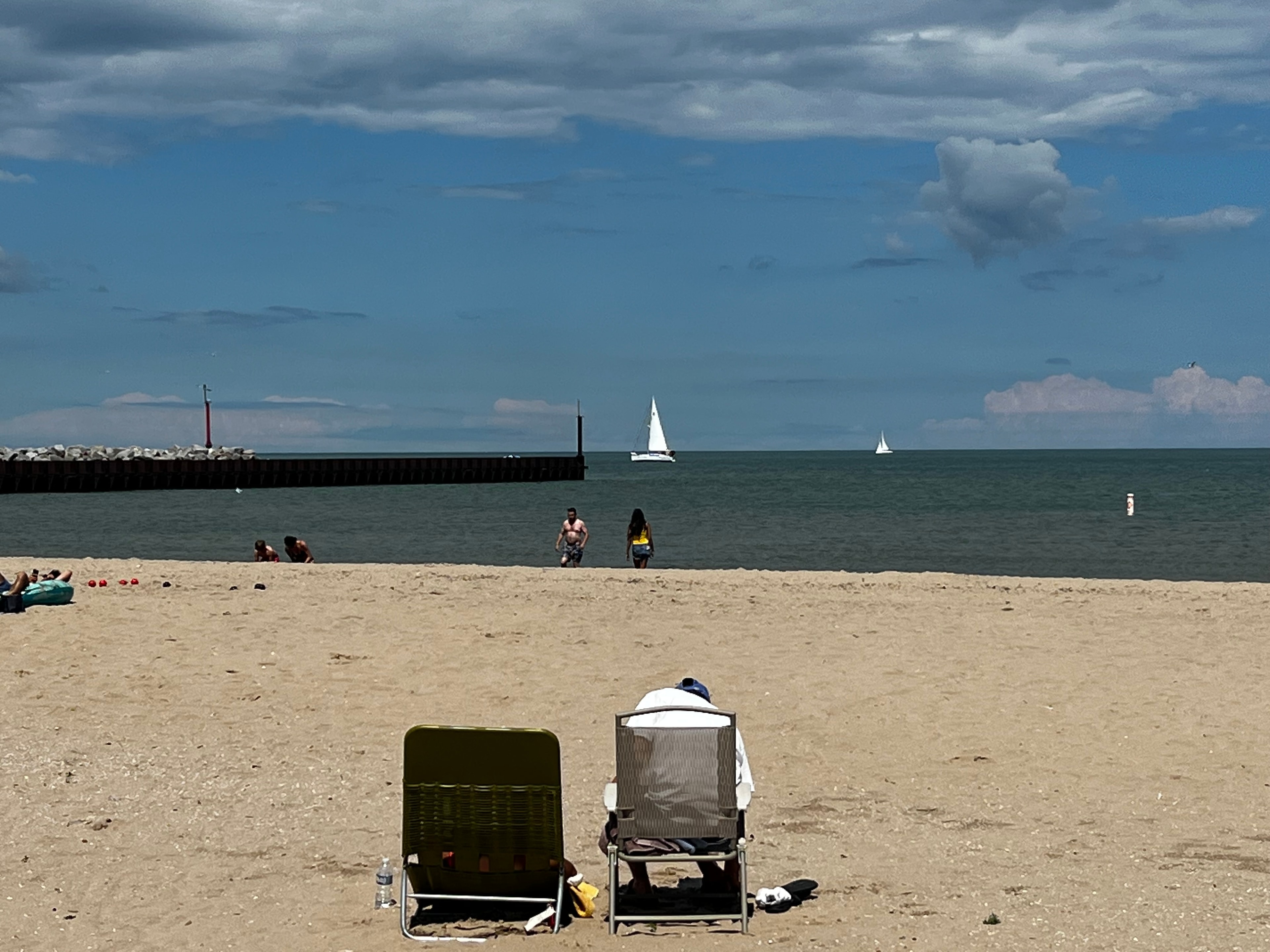 Sandy Lake Michigan beach with clear blue sky
